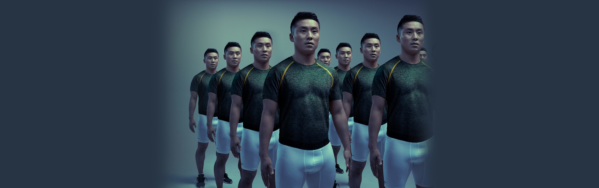 An Asian/Pacific Islander man with a soccer ball