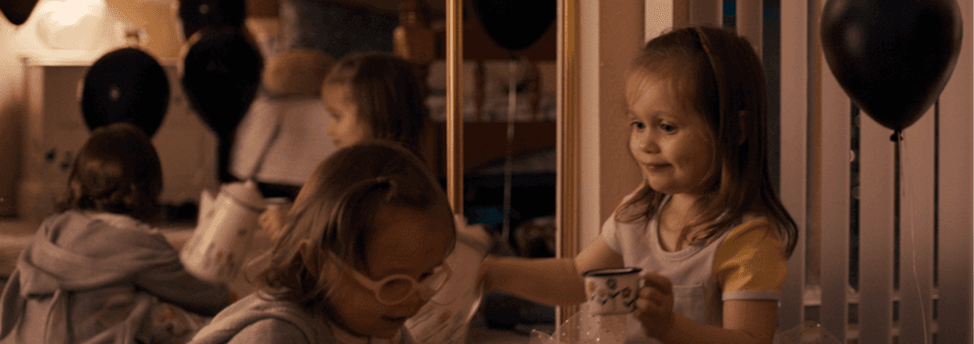 Children playing with balloons
