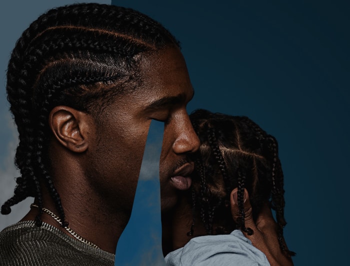 Man holding child crying