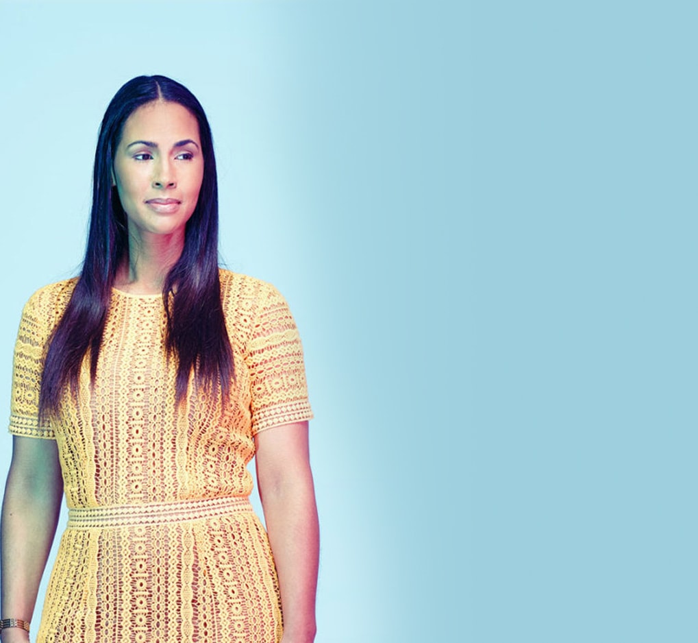 An American Indian woman in a yellow dress
