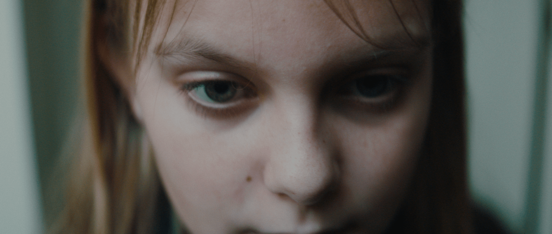 video preview showing a close up of a girl looking anxious