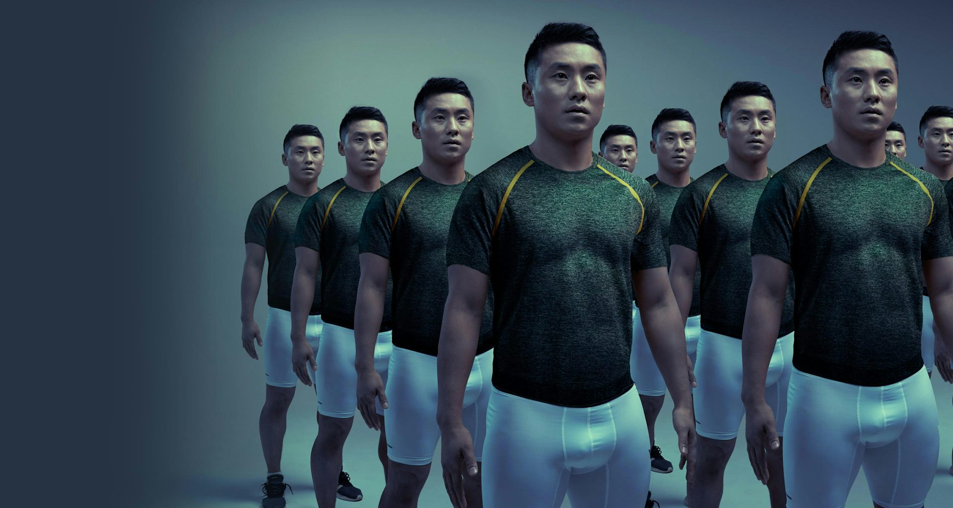 An Asian/Pacific Islander man standing with clones of him next to each other